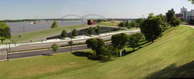 The terminal building's bridge-like green roof reduces the building's cooling load and stormwater runoff.